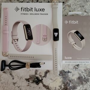 Fitbit Luxe Tracker with Pink and Lunar White Bands